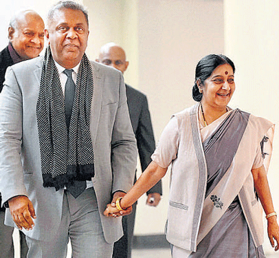 External Affairs Minister Sushma Swaraj welcomes her Sri Lankan counterpart Mangala Samaraweera in NewDelhi on Sunday. PTI