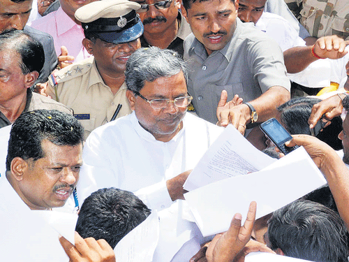 Karnataka Chief Minister Siddaramaiah on Tuesday reiterated his government's commitment to position the State at the helm of the Indian IT industry by initiating more forward-looking policy initiatives.  Dh Photo,