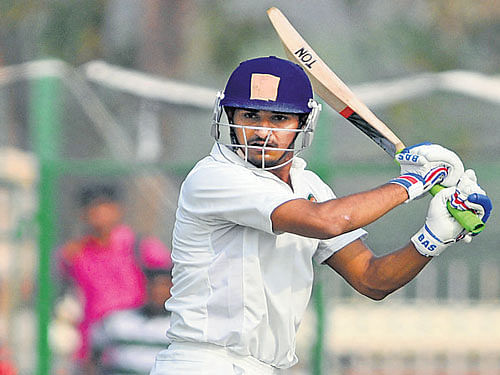 stand and deliver: Baroda's Deepak Hooda smashes one through the off-side during his knock of 142 against  Karnataka on the opening day of their Ranji Trophy tie in Mysuru on Wednesday. dh photo/ Prashanth H G
