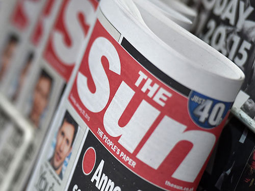 British tabloid The Sun published a photo of a winking topless model today, shooting down reports it had ended the controversial tradition that has featured in the newspaper since 1970. Reuters File Photo.