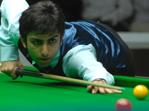 India's poster boy of cue sport Pankaj Advani posted back to back wins with identical scorelines of 4-0 to storm into the quarterfinals of the Senior National Snooker Championship at the Bengal Rowing Club today. DH File Photo.
