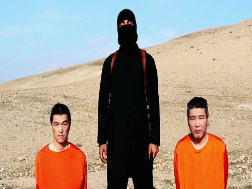 Japan today vowed to 'never give up' its struggle to save two Japanese hostages held captive by Islamic State militants after the deadline to pay their ransom passed in agonising silence. AP photo