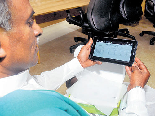 The State government on Saturday launched tablet computers designed specially for farmers. Information about agriculture will be available on the device in Kannada and English.  DH File Photo.