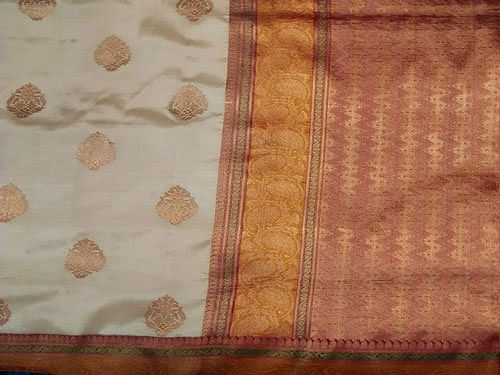 An exquisite hand-woven Banarasi silk saree with gold and silver threads, which took weavers three months to complete, will be presented to American First Lady Michelle Obama during her three-day visit to the country. Image Courtesy: Facebook