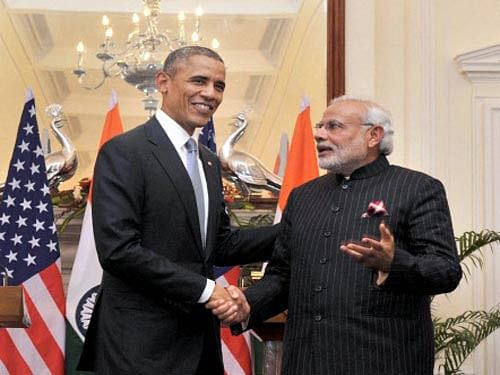 Prime Minister Narendra Modi and US President Barack Obama at a joint press conference at Hyderabad House in New Delhi on Sunday.