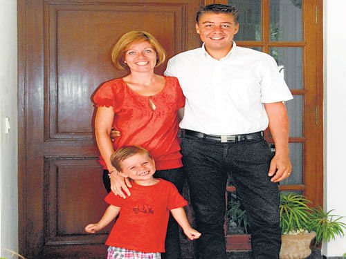 open-minded Aurelien Capron and Amelie with their son Antoine.