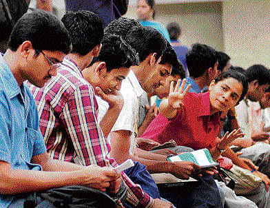 The fate of more than 30,000 candidates across the State taking the II PU exam in private this March, hangs in balance as universities are of the view that these candidates do not meet the educational requirement of "Plus 2" to enrol for degree courses. Dh File Photo for representation.