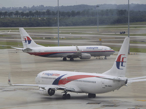The website of Malaysia Airlines was commandeered for several hours today by hackers who referenced the Islamic State jihadists and threatened to expose data taken from the carrier's servers. AP File Photo.