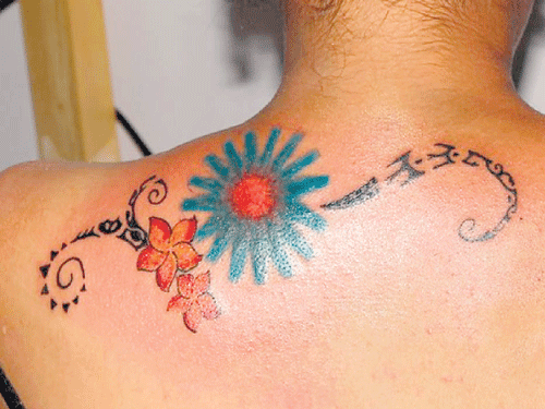 intricate A tattoo by Rajesh.