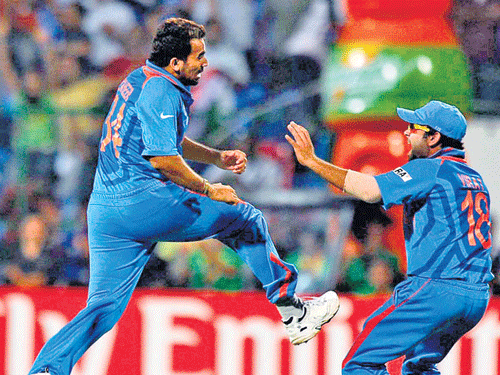 Zaheer Khan celebrates a wicket in the India-England tie in 2011. DH Photo