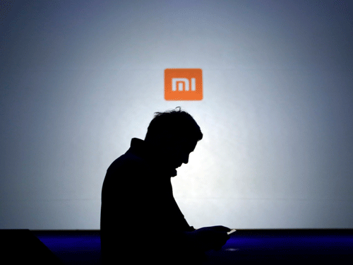 Chinese handset-maker Xiaomi Wednesday launched its new flagship device, the Mi 4, for Rs.19,999 in India, a company statement said here. Reuters File Photo.