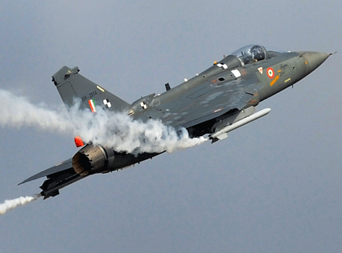 India will showcase and hard sell its indigenous Light Combat Aircraft (LCA) Tejas at an air show here in February to prospective buyers from overseas, a top official said Wednesday. DH File Photo.