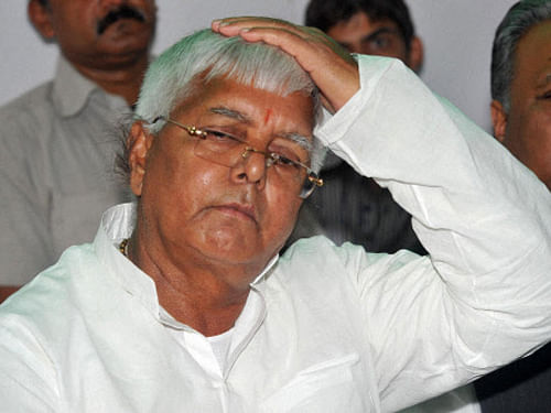 Rashtriya Janata Dal (RJD) President Lalu Prasad on Wednesday indicated he may plough a lonely furrow with the much-hyped Janata Parivar merger talks making little headway. PTI (File Photo)