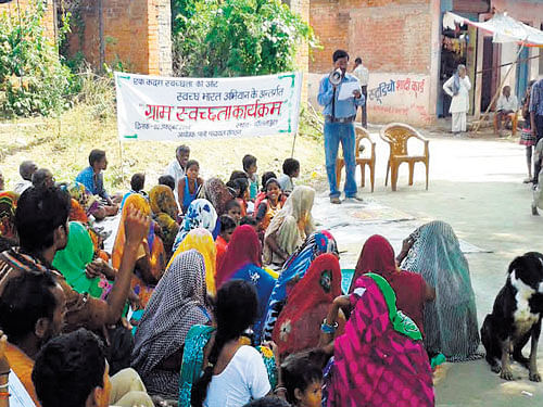 Sanjay Singh addresses villagers.