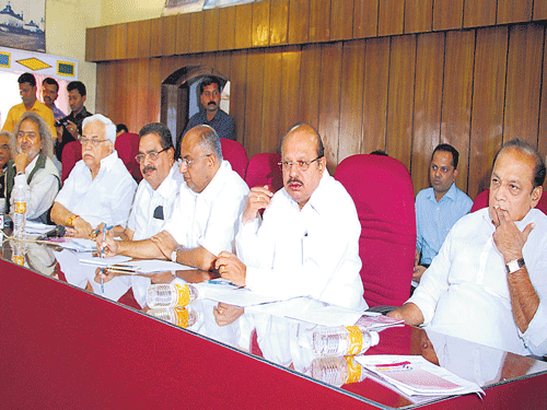 Minister for Forests, Ecology and Environment B Ramanath Rai chairs the cabinet sub-committee meeting held to consult the elected representatives and the public on the Kasturirangan report in Madikeri on Saturday. DH&#8200;photo