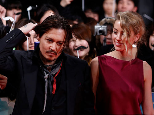 Hollywood couple Johnny Depp and Amber Heard are reportedly planning to tie the knot at the superstar's private island in the Bahamas. Reuters File Photo.