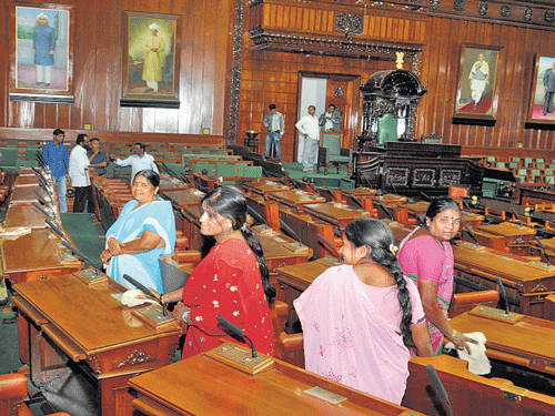 Preparations are on in full swing at the Legislative Assembly hall in Vidhana Soudha on Sunday. DH Photo