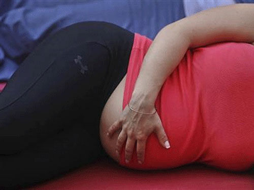 Mother's lifestyle and diet even before conception can affect the chance of her kids becoming obese later in life. Reuters File photo