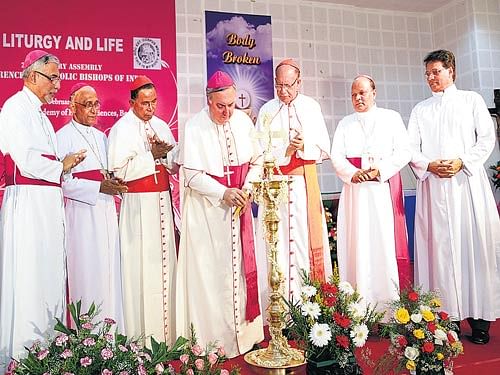 The Pope's ambassador to India and Nepal, Archbishop Salvatore Pennachio (5th from left), inaugurates the 27th Plenary Assembly of the Conference of the Catholic Bishops of India (CCBI) in Bengaluru on Tuesday. With him are (left to right) CCBI deputy secretary general Fr Stephen Alathara; CCBI vice president Archbishop Filipe Neri Ferrao of Goa and Daman; Archbishop Bernard Moras of Bangalore; Cardinal Telesphore Placidus Toppo, Archbishop of Ranchi; CCBI&#8200;president Cardinal Oswald Gracias, Archbishop of Bombay; CCBI secretary general Bishop Varghese Chakkalakal of Calicut; and Director of St John's Medical College Fr Paul Parathazham. DH Photo