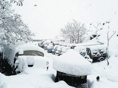 A view of the snow-covered CRPF camp near Jawahar Tunnel, the gateway to Kashmir valley, on  Tuesday.  PTI