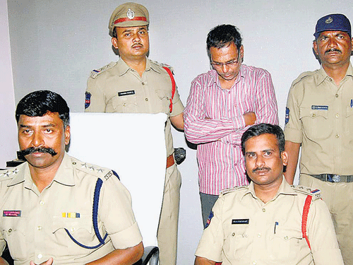 Sayed Zakir Husain (centre), a police head constable at IDA Bollaram, and his wife Raziya Sultana (not in picture) are accused of torturing and killing Shahista Sabah, a five-year-old girl they brought from Gulbarga five months ago.  Mohammed Arif