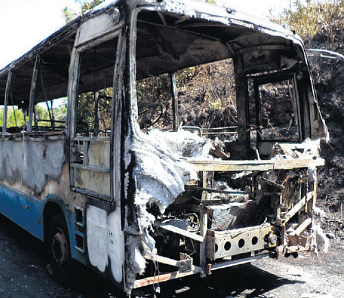 The charred remains of a Kadamba Transport Corporation Limited bus that caught fire due to short circuit at Polem on Goa-Karnataka border on Thursday morning. dh photo