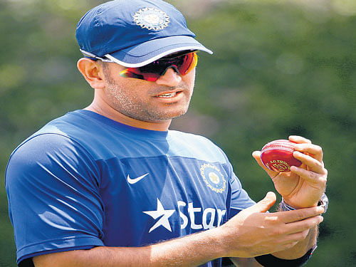 cup full of worries: Indian skipper MS Dhoni wants a better effort from his bowlers in the death overs. AFP