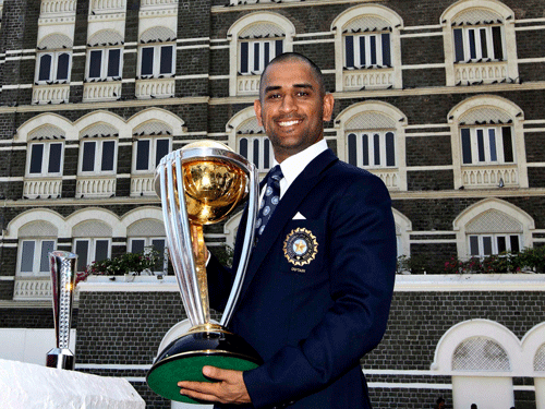 Mahendra Singh Dhoni's image of holding the World Cup trophy at Wankhede has been immortalised in cricketing folklore but not many know that Indian cricket's poster boy was once a ticket collector at the Kharagpur railway station.AP file photo