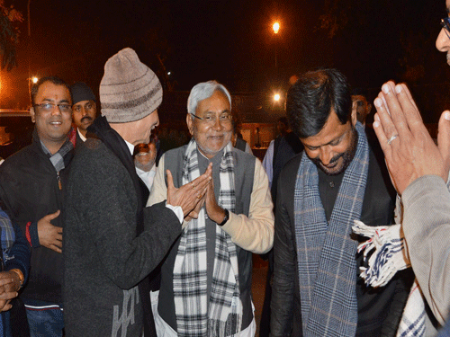 Former Bihar CM Nitish Kumar with his supporters after attending a party meeting in Patna on Saturday. PTI photo