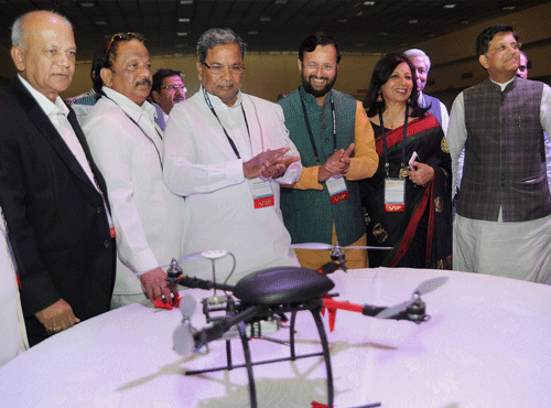 CUTTING-EDGE: Chief Minister Siddaramaiah at the inauguration of Bangalore India Bio 2015 in City on Monday. Also seen are Minister of State for Environment and Forests Prakash Javadekar, Minister of State for Power, Coal and Renewable Energy Piyush Goyal, State ministers R Roshan Baig, S R Patil and Kiran Mazumdar-Shaw, CMD, Biocon, and others. DH&#8200;PHoto