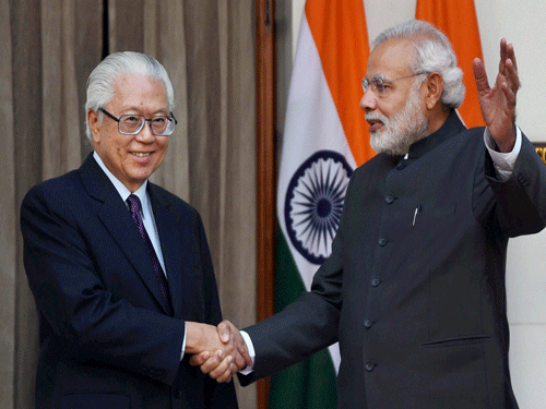 Prime Minister Narendra Modi, right, along with Singapore's President Tony Tan Keng Yam before their meeting in New Delhi on Monday. PTI Photo