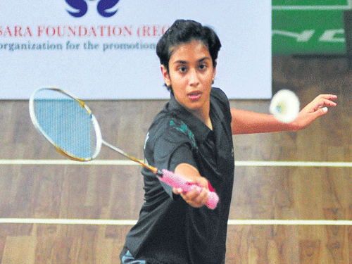 Drithi Yatheesh returns during her quarterfinal win over Trisha Hegde in the U-15 girls singles. DH photo