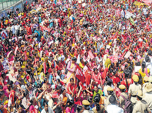 Thousands of people were put to hardship as their vehicles got jammed in traffic in central parts of the City for over five hours on Thursday following a huge rally taken out by anganwadi workers to draw the government's attention to their long-pending demands.  DH photo