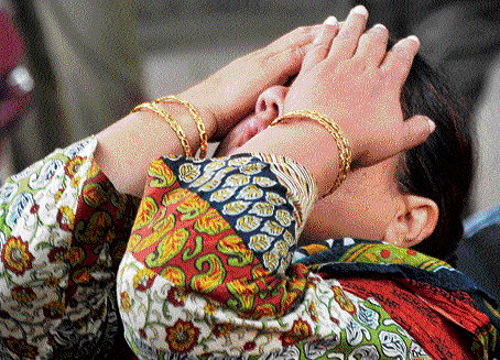 Tabassum, mother of Ayesha, is inconsolable. DH photo