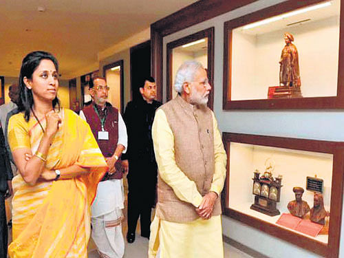 the viewing: Prime Minister Narendra Modi with NCP MP Supriya Sule at a function to lay foundation stone of Centre of Excellence for Vegetable Production in Baramati, Maharashtra, on Saturday.  pti photo