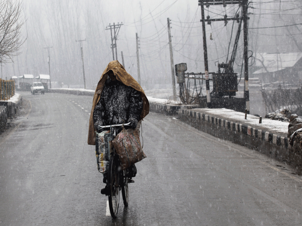 Kashmir Valley received fresh snowfall and rains even as the minimum temperature across the Valley and Ladakh region increased for the second consecutive day on Monday.AP File photo