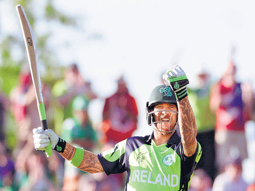Minnows make merry: Ireland's John Mooney celebrates after hitting the winning runs against the West Indies in Nelson, New Zealand, on Monday. REUTERS Photo
