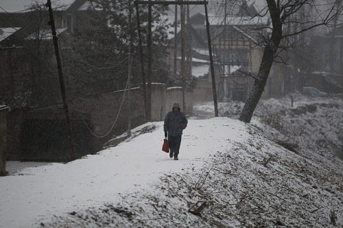 With intermittent rains in plains and snowfall in upper reaches continuing in Kashmir for the second day on Tuesday, officials have advised the state administration to remain alert to possible avalanches and landslides in hilly areas. PTI File Photo
