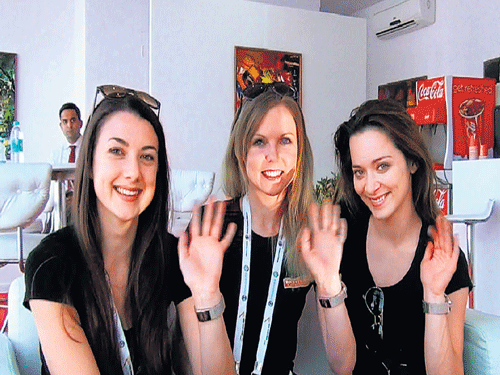 Nikita Salmon, Freya Paterson and Danielle Hughes in a  relaxed mood on Wednesday after their aerobatic display.