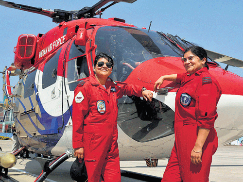 IAF aerobatic team Sarang's Squadron Leader Deepika and Wing Commander Bhavana pose for a photograph.