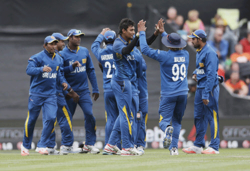 Sri Lanka captain Angelo Mathews elected to make first use of the favourable bowling conditions by asking Afghanistan to bat after winning the toss in their World Cup match in Dunedin on Sunday.  Reuters photo