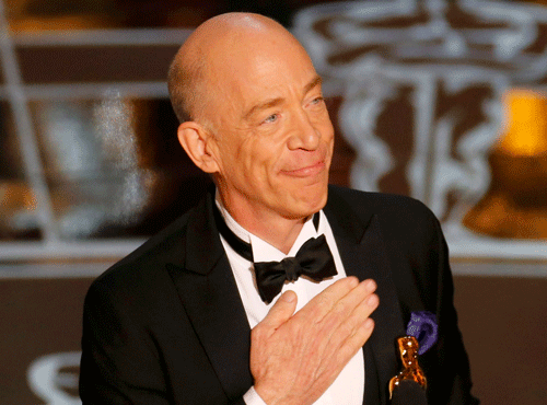J.K. Simmons receives the Oscar for actor in a supporting role for 'Whiplash' at the 87th Academy Awards in Hollywood, California