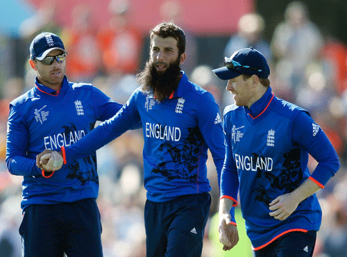 Riding on opening batsman Moeen Ali's cracking 128, an under-fire England notched up their first win in the ongoing cricket World Cup by crushing minnows Scotland by 119 runs in a Group A clash here today. Reuters photo