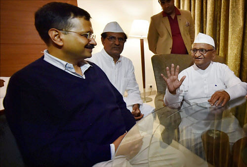 Delhi Chief Minister Arvind Kejriwal and social activist Anna Hazare at a meeting at Maharashtra Sadan in New Delhi on Monday. PTI Photo