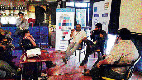 Funny side up. Hooked to humour, this year's 'Social Media Week' seems addicted to those whacky, adorably irreverent stand-up comedians. As if one artiste wasn't enough to launch the week on Monday, SMW on Wednesday had an entire bunch of three, who wouldn't stop talking! Of course, they talked sense when they collectively conversed about 'Humour in blogs and Twitter.' DH photo