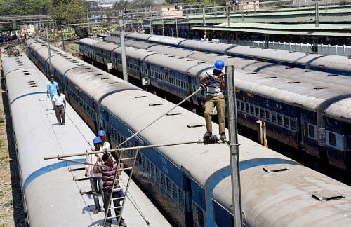 Railway Minister Suresh Prabhu on Thursday earmarked over Rs 2,450 crore for Karnataka's ongoing projects, of which Rs 368 crore has to be borne by the state on cost-sharing basis. DH photo
