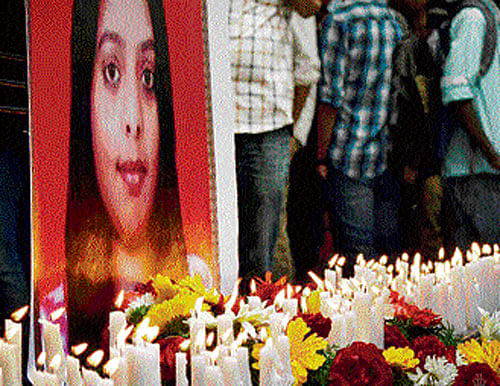 PROMISING LIFE SNUFFED OUT: A candlelight vigil was held in Bengaluru on Friday in memory of 19-year-old Arpitha who was killed in a road accident. DH PHOTO