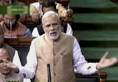 Prime Minister Narendra Modi speaks in the Lok Sabha during the budget session in New Delhi on Friday. PTI Photo / TV GRAB