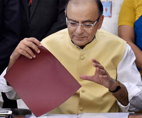 Finance Minister Arun Jaitley giving final touch to the annual budget in New Delhi on Friday, a day before its presentation in the Lok Sabha. PTI Photo