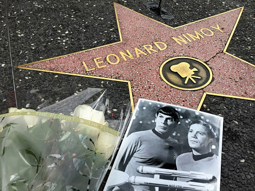 Flowers adorn the Hollywood Walk of Fame star of Leonard Nimoy in Los Angeles Friday, Feb. 27, 2015. Nimoy, famous for playing officer Mr. Spock in "Star Trek" died Friday, Feb. 27, 2015 in Los Angeles of end-stage chronic obstructive pulmonary disease. He was 83. AP photo